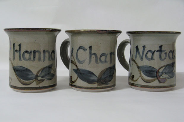 three custom pottery mugs 